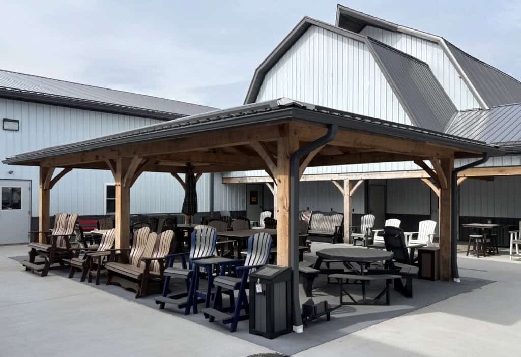 Custom Amish-built backyard pavilion providing a shaded outdoor living space with durable timber construction.