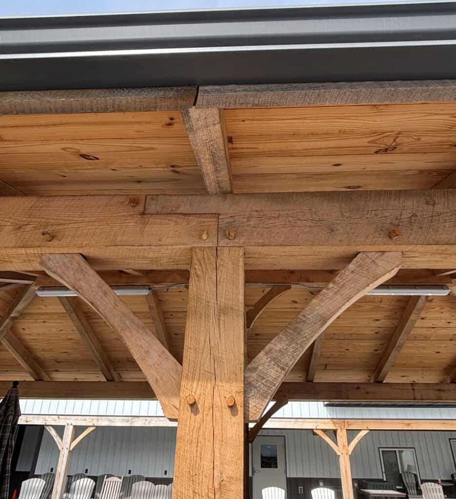 Handcrafted Amish pavilion with heavy timber posts and classic craftsmanship for a durable outdoor gathering space.